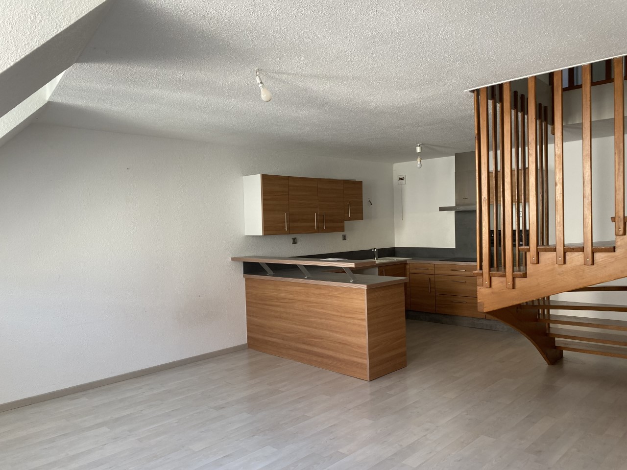 Photo T4 duplex à  louer - Au centre de Baume-les-Dames image 3/6