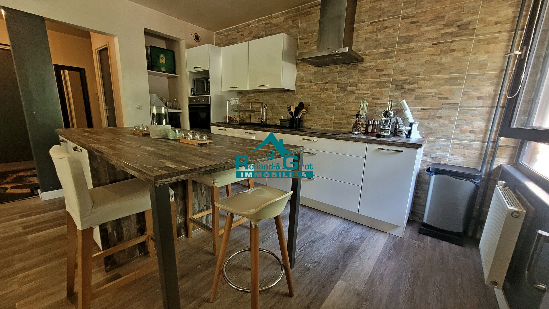 Agence immobilière de Rolland,  Girot Immobilier