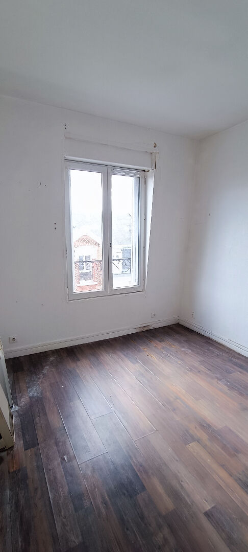 Photo APPARTEMENT A VENDRE AU CENTRE-VILLE DE SAINT QUENTIN image 1/2