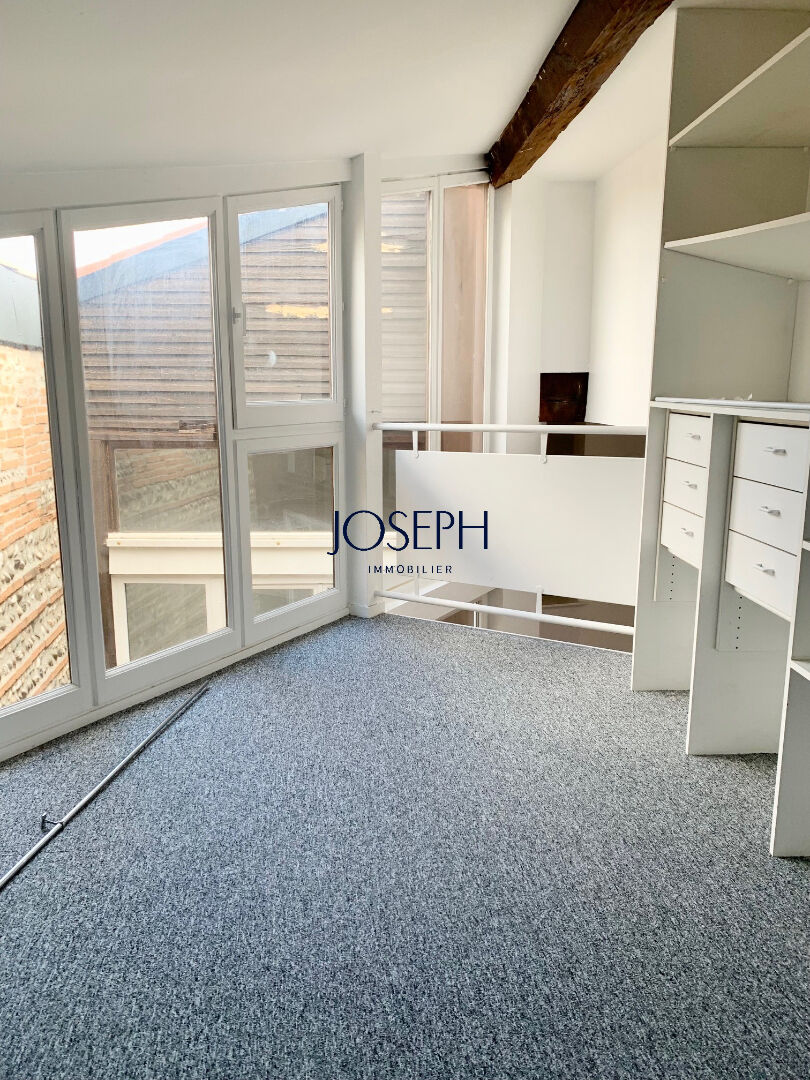 Photo MARENGO MEDIATHEQUE - Grand T3 mezzanine atypique de 87 m² avec patio image 5/5