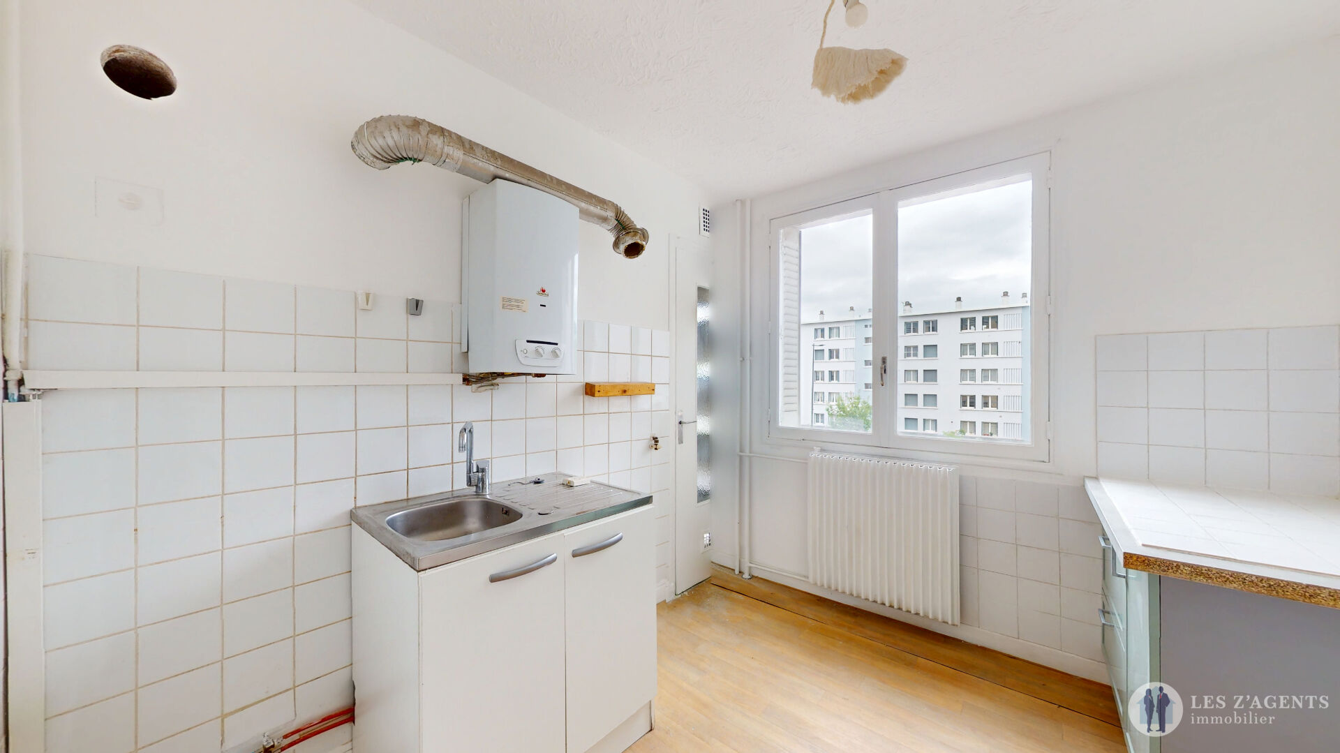 Photo Appartement T4 de 65m² avec balcon + cave image 5/6