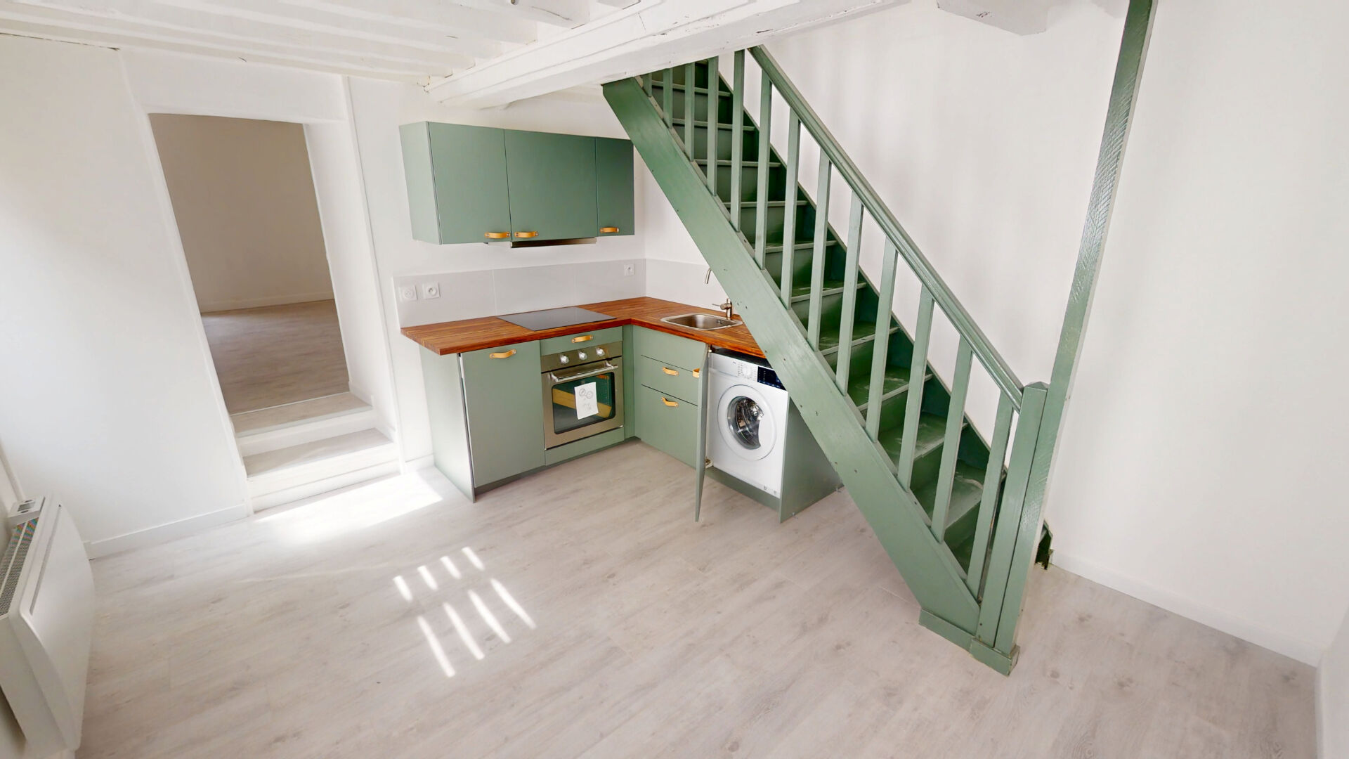 Photo DUPLEX RÉNOVÉ LUMINEUX DE 38 M2 - PLEIN CENTRE HISTORIQUE image 2/6