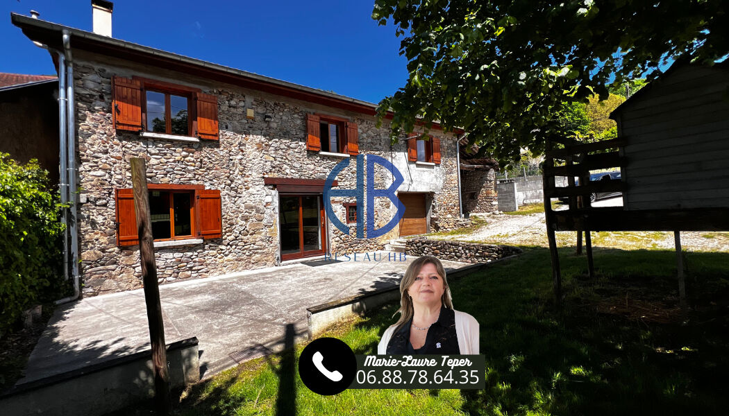 Photo Maison en pierre  128 m² -- 4 ch -- sur terrain plat 970 m² image 2/6