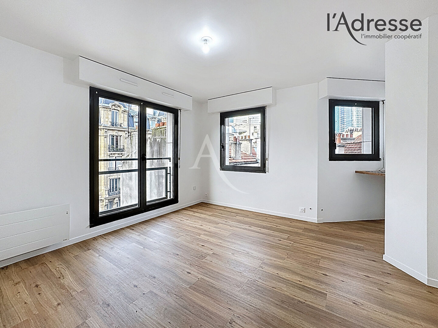 Photo Studio Puteaux/Rue de la République  23.43 m2 Cave + Parking image 2/6