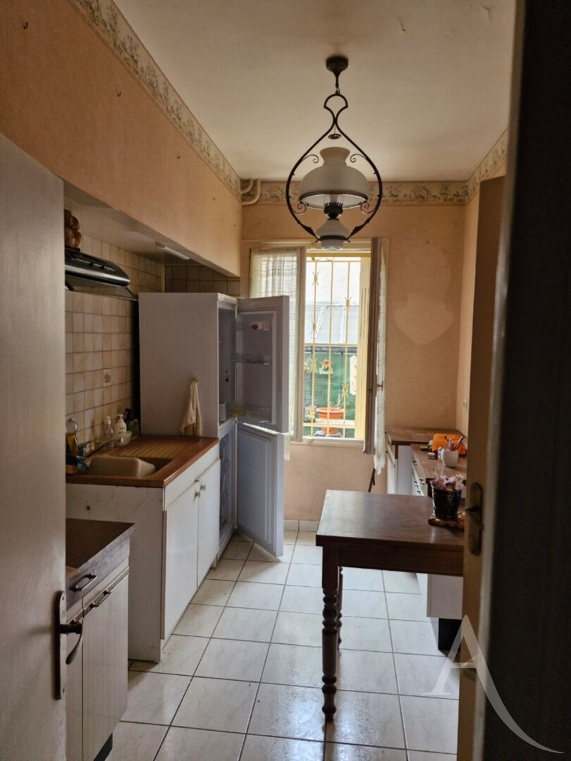 Photo Toulouse Guilhemery maison de 72 m2 avec  jardinet ;fort potentiel image 3/5