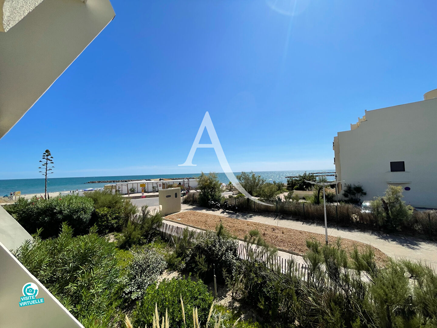 PALAVAS LES FLOTS - RIVE DROITE - APPARTEMENT T3 - 63 M2 - CHAMBRE - CABINE - DRESSING - 63M2 - TERRASSE - VUE MER - PARKING PRIVÉ COMMUN