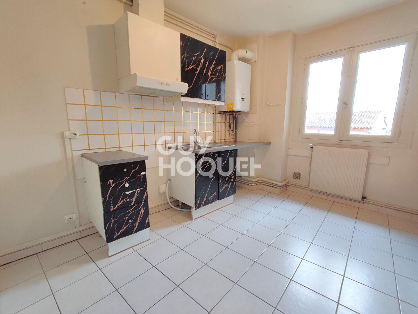 Appartement 3 chambres avec garage hypercentre