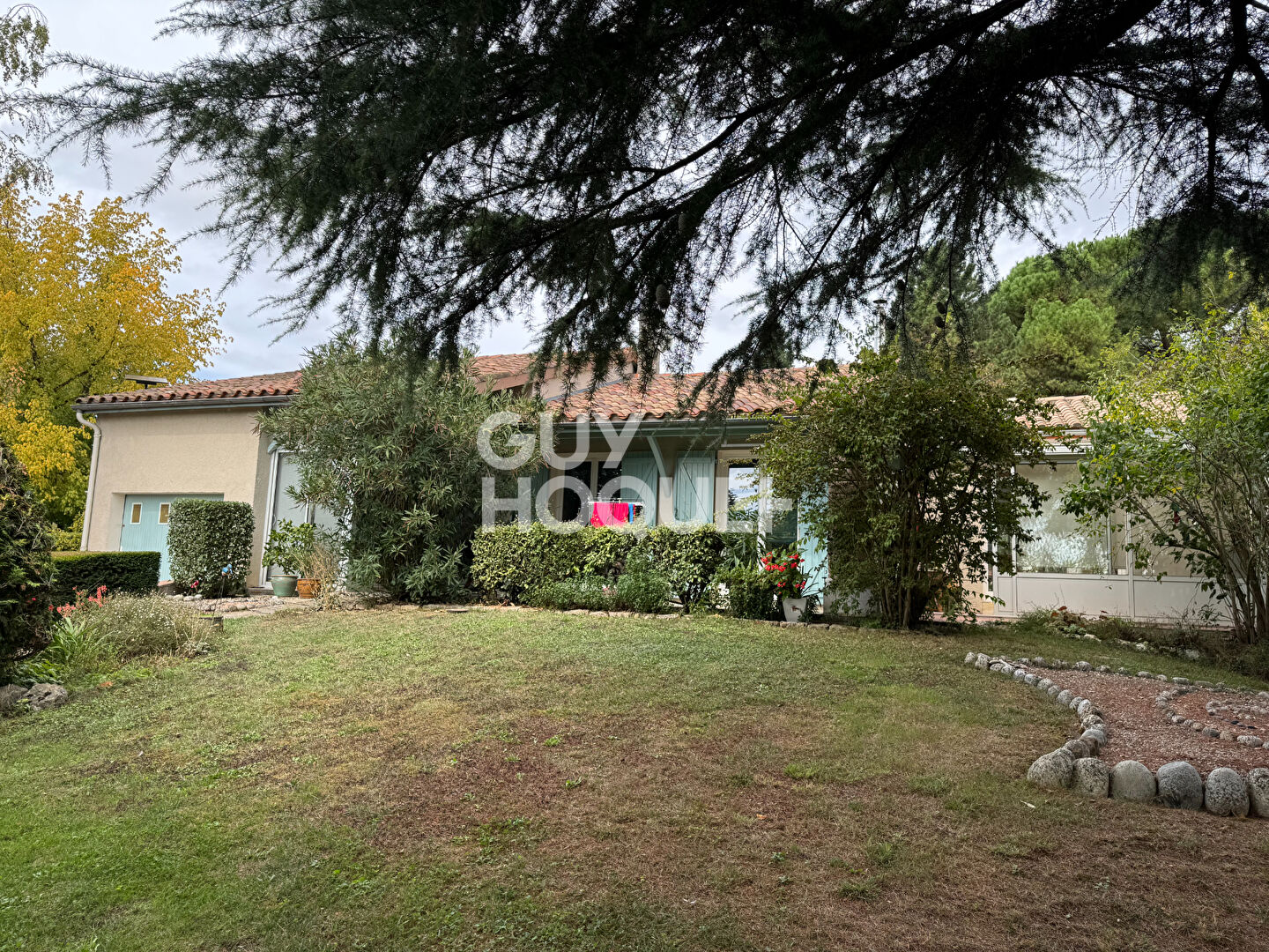 Maison plain pied avec  garage et jardin clos