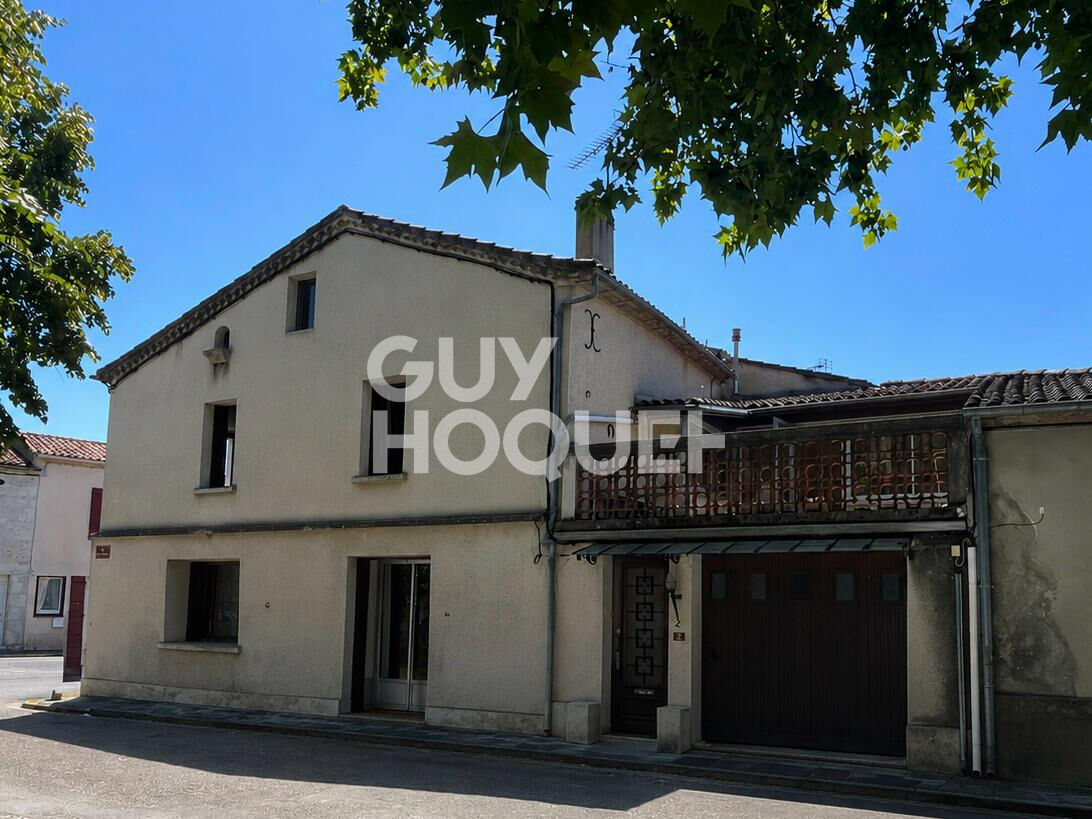 Maison de village avec terrasse, garage et jardin