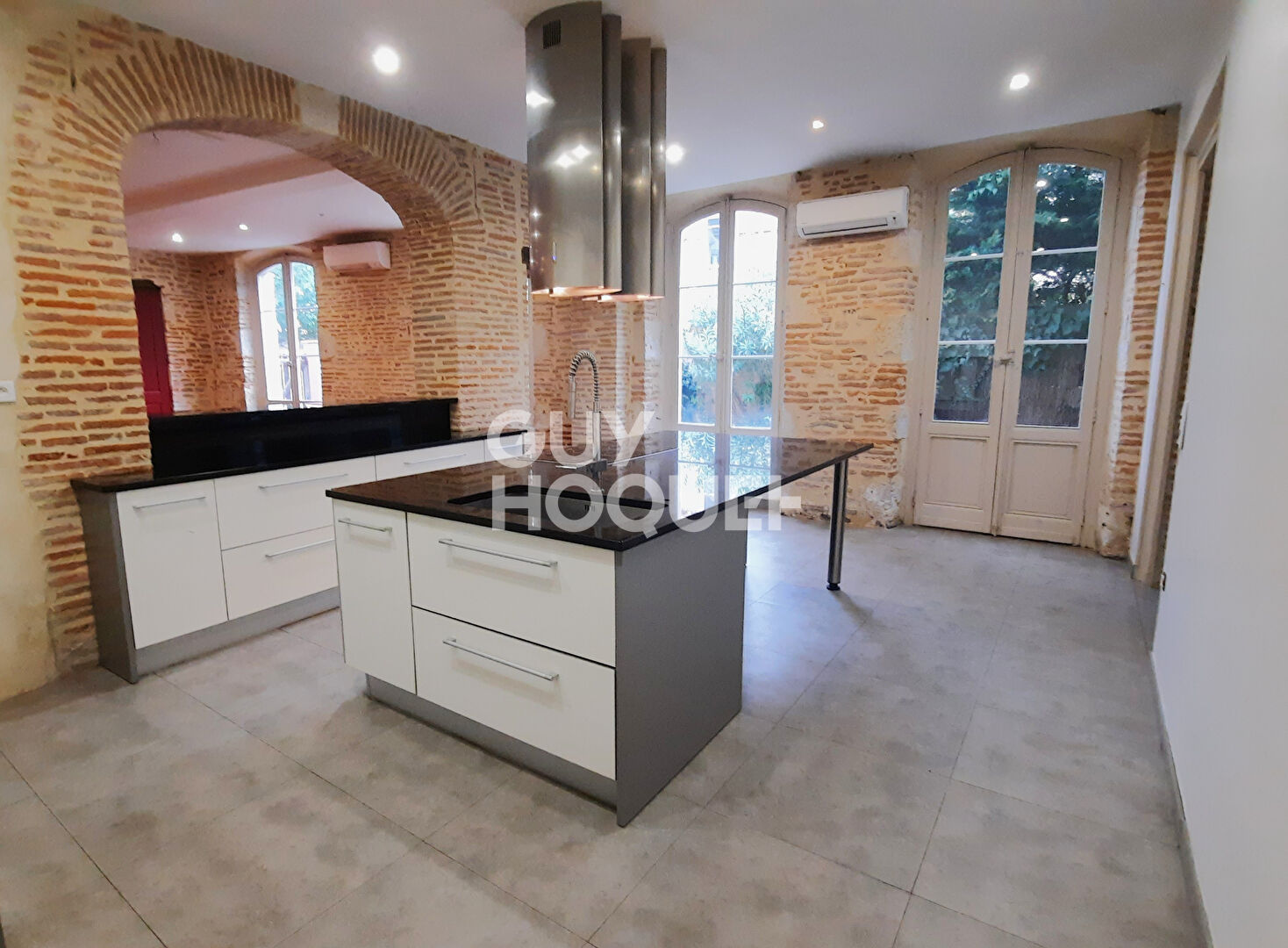 Appartement de caractère en centre-ville, avec terrasse