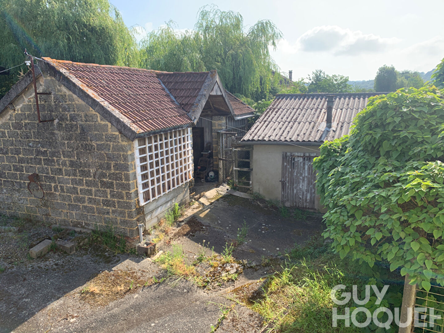 Maison avec dépendances et terre agricole