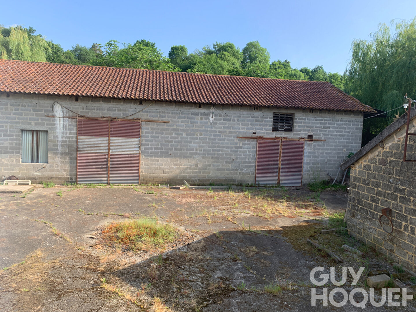 Maison avec dépendances et terre agricole