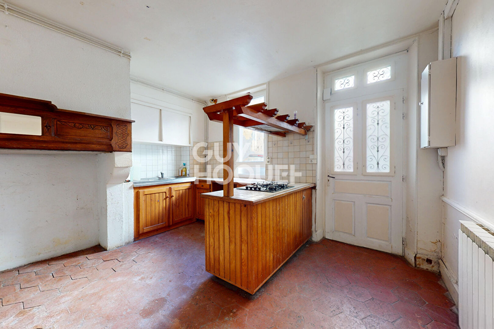 Maison de ville 149 m² au coeur historique d'Hagetmau avec beau potentiel