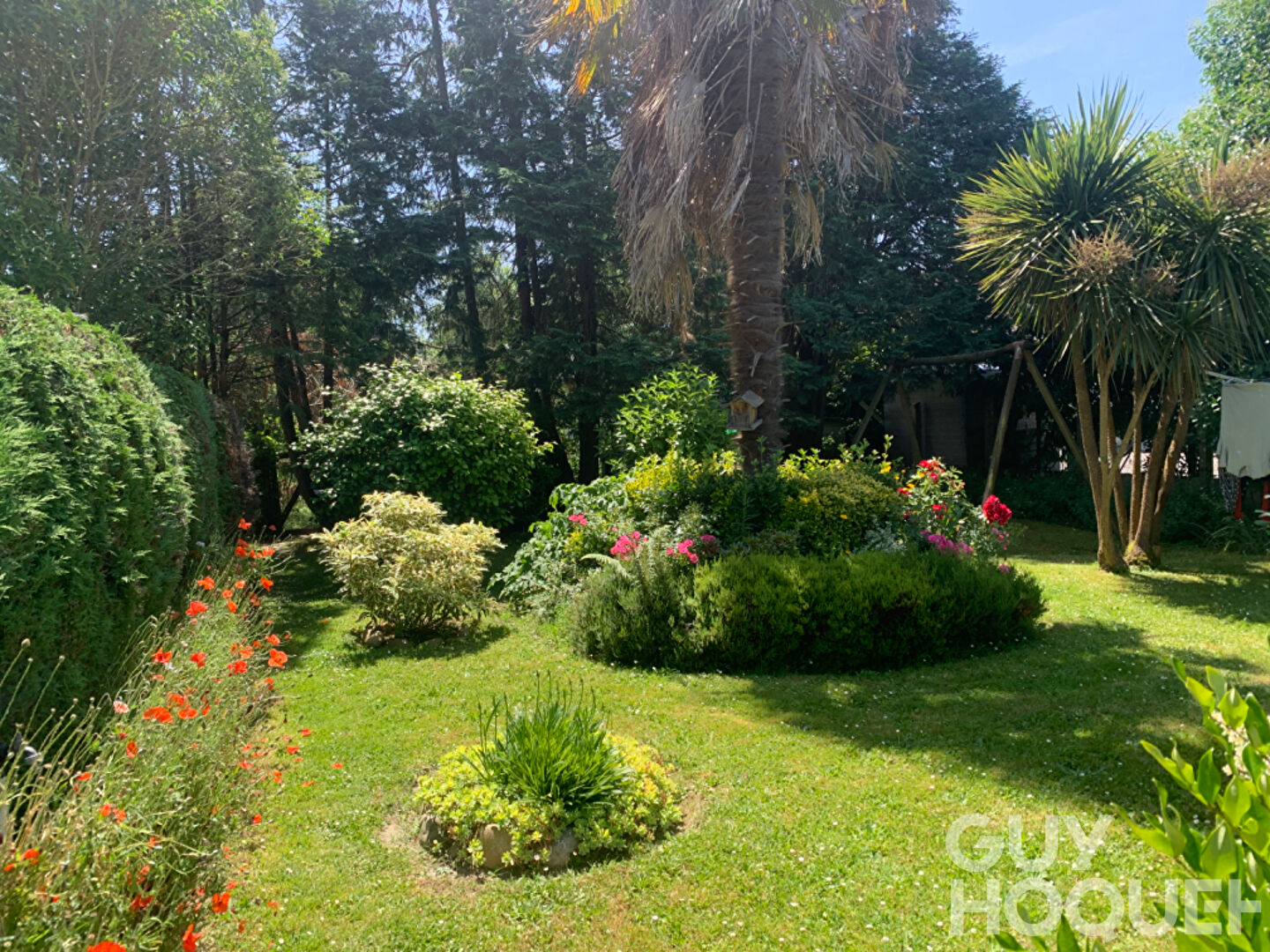 Appartement  4 pièces sur 2 niveaux avec jardin et deux places de parking