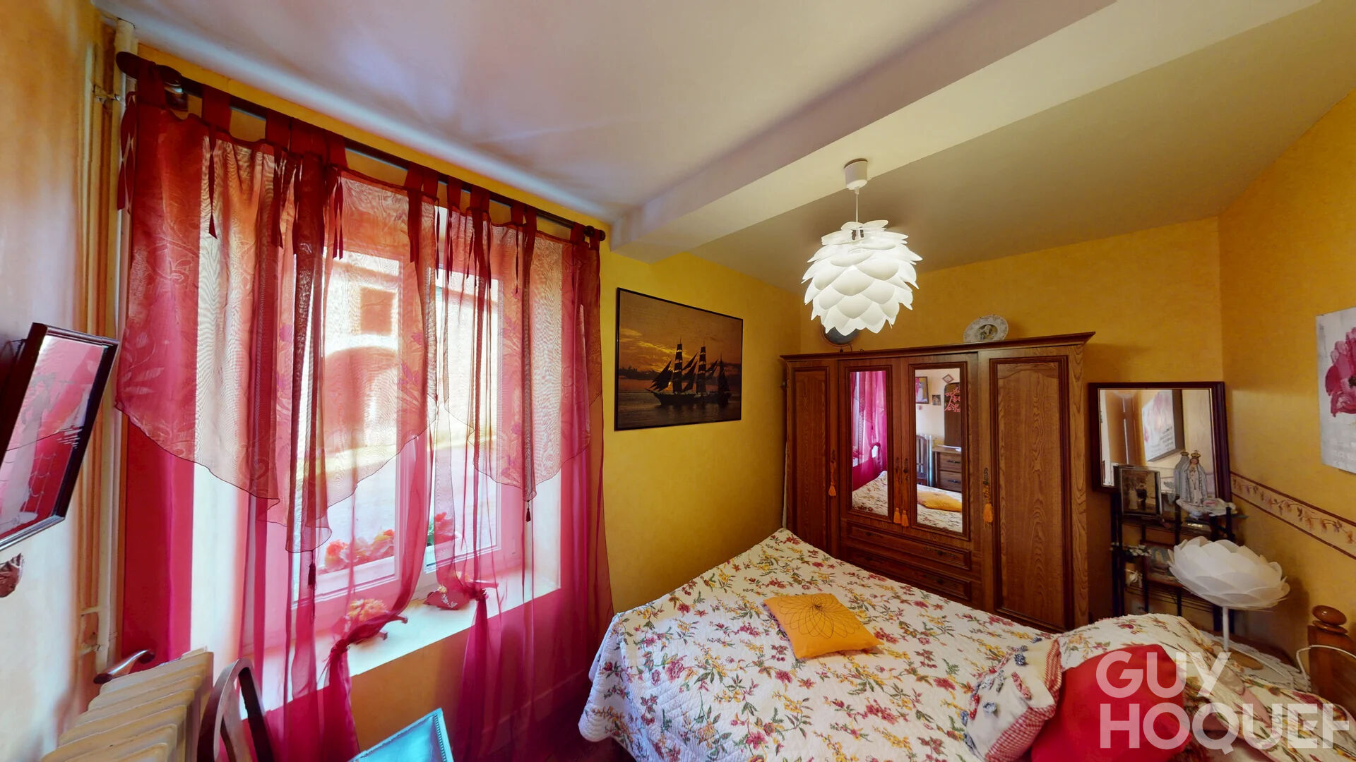Appartement  4 pièces sur 2 niveaux avec jardin et deux places de parking