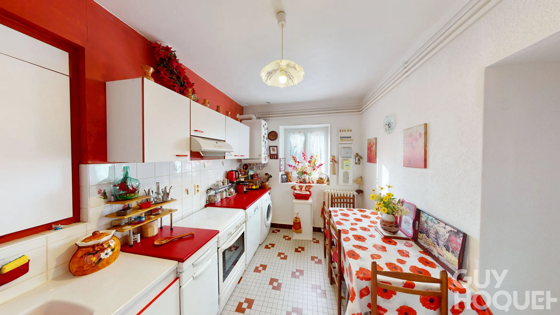 Appartement  4 pièces sur 2 niveaux avec jardin et deux places de parking
