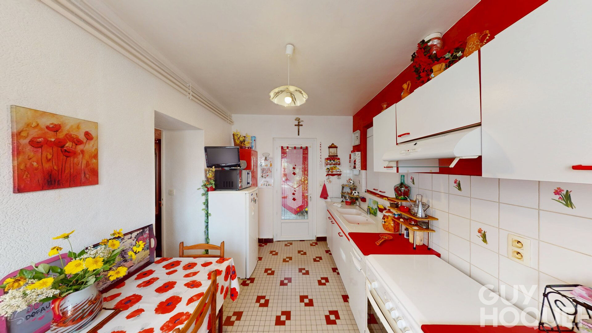 Appartement  4 pièces sur 2 niveaux avec jardin et deux places de parking