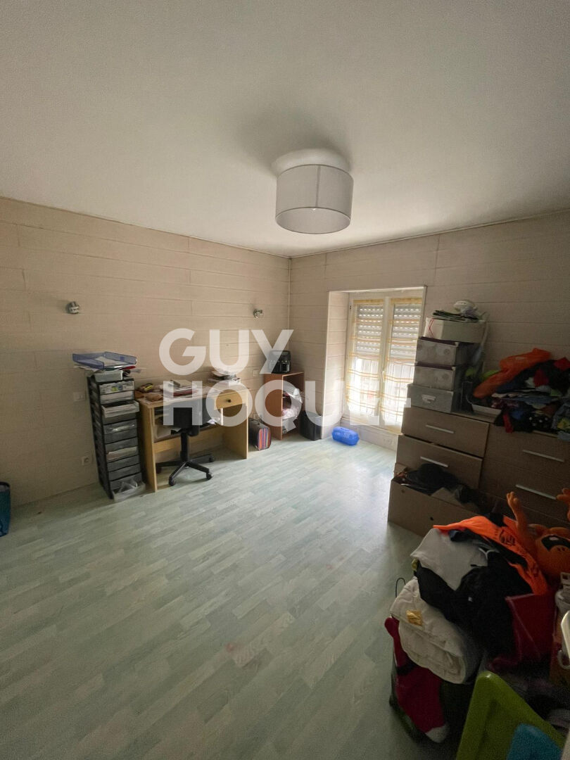 À vendre Local commercial  + Appartement en duplex, centre de Baud