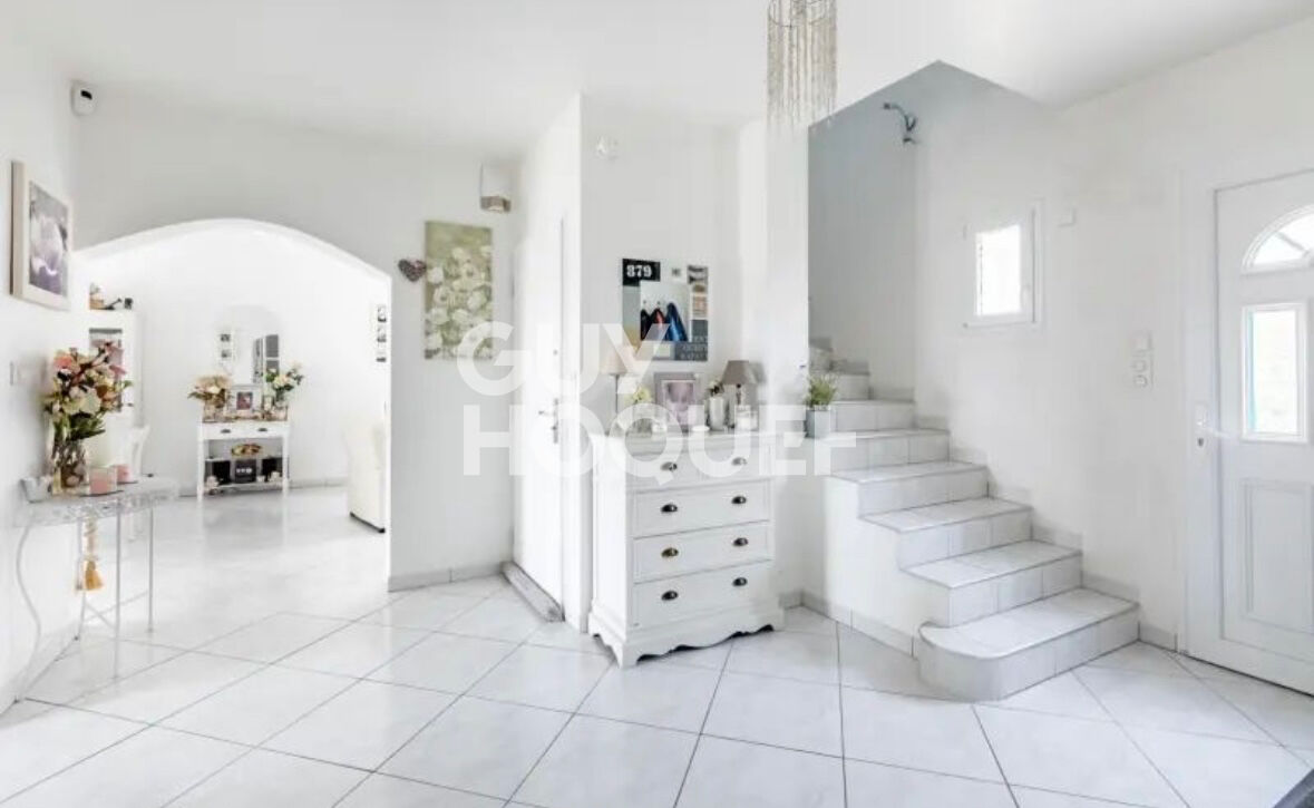 Maison spacieuse dans secteur recherché - 4 chambres, jardin et confort moderne