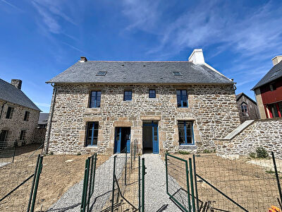 Modernité et charme pour cette maison au coeur de Saint Suliac