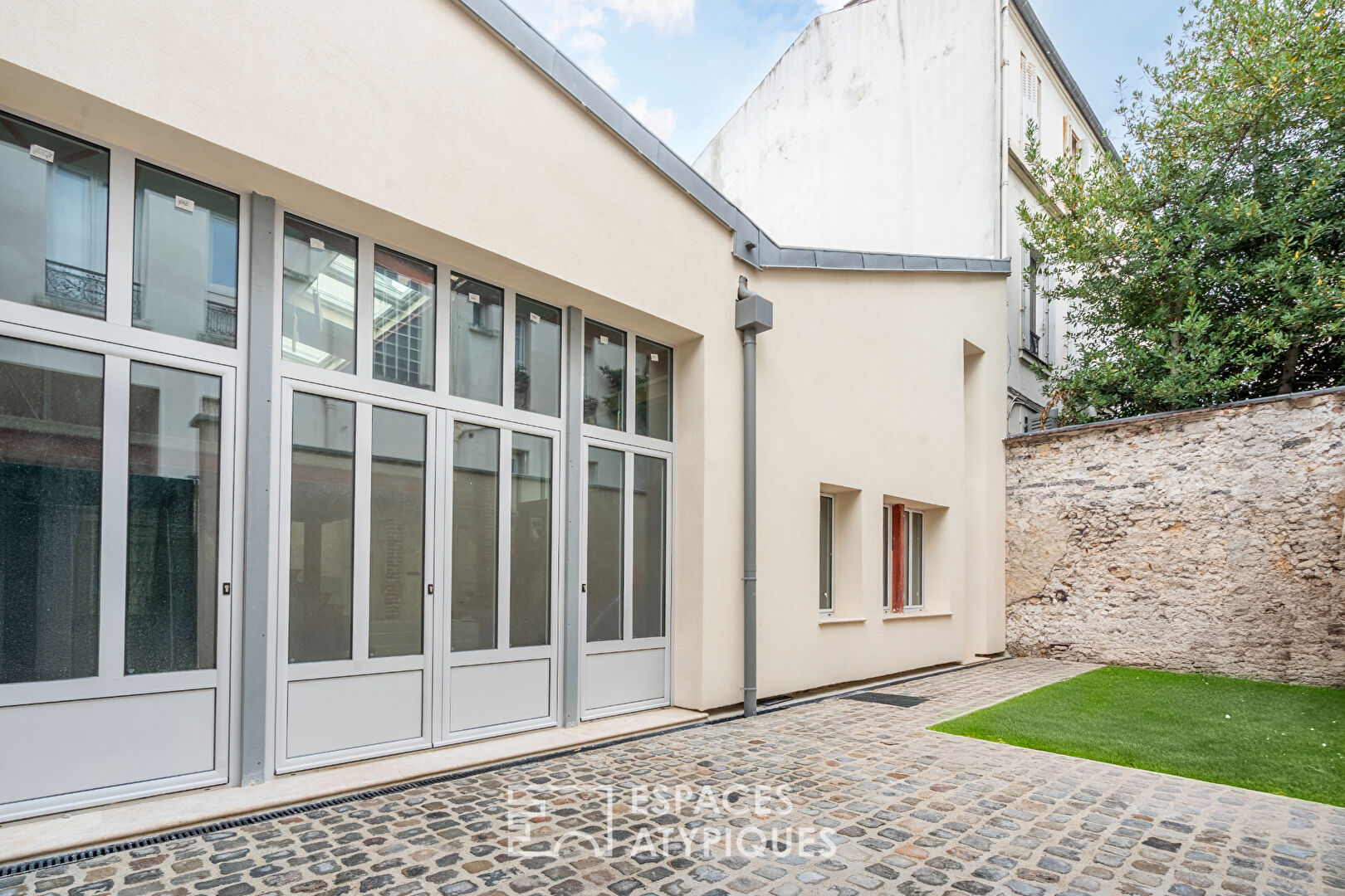 Loft avec jardin à aménager en hyper centre de Vincennes