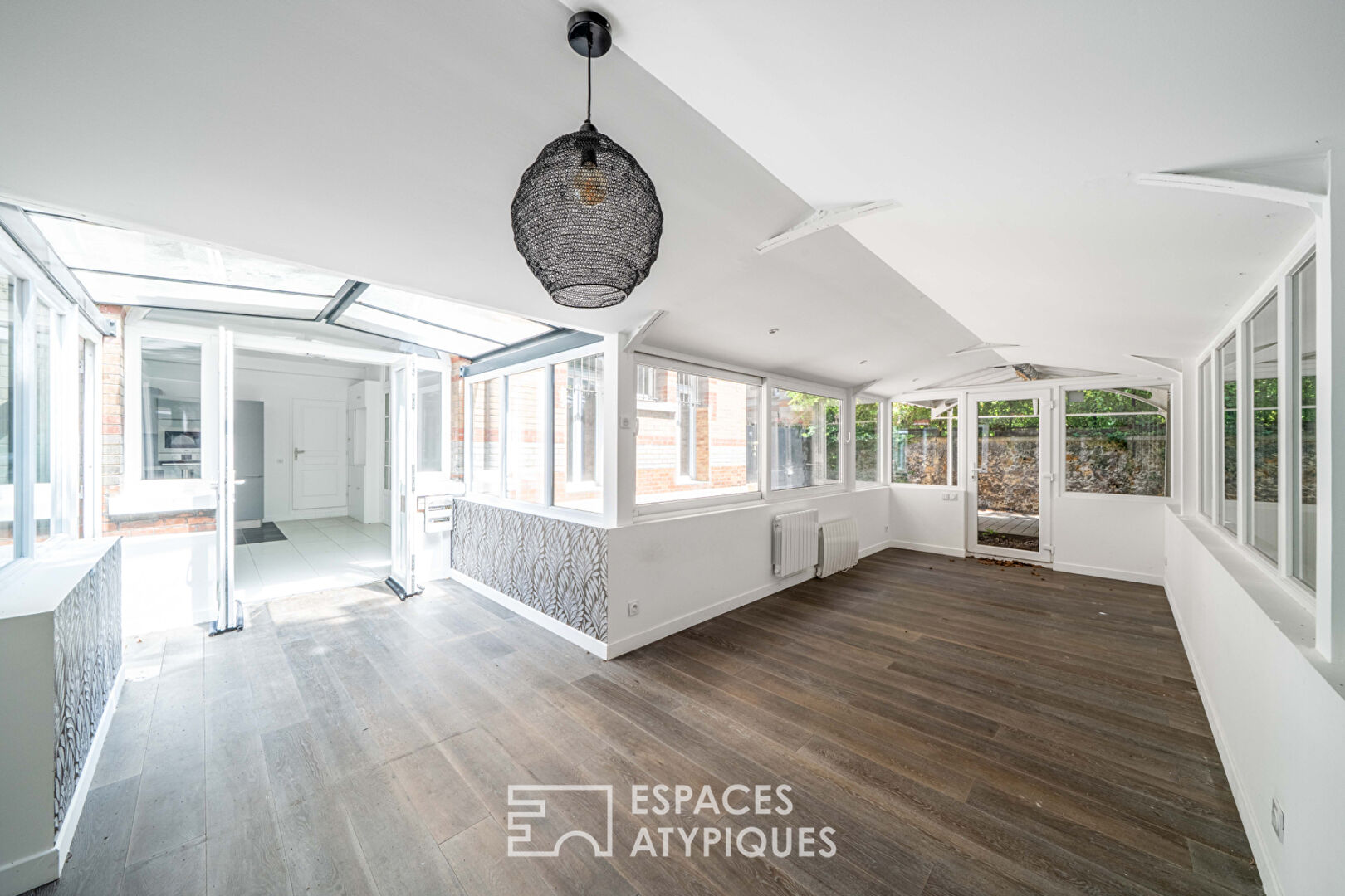 Photo Rez-de-jardin avec terrasses et véranda, rue de la Colonie image 3/6