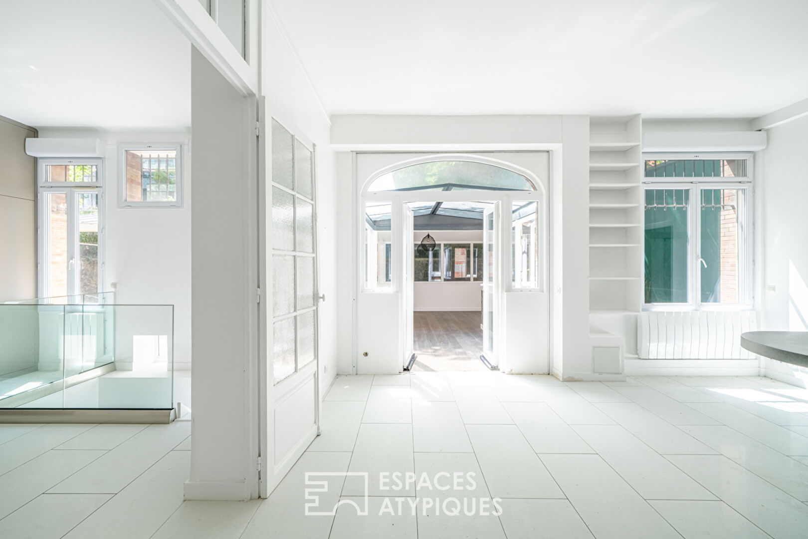 Photo Rez-de-jardin avec terrasses et véranda, rue de la Colonie image 5/6