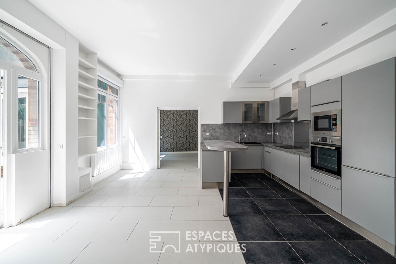 Photo Rez-de-jardin avec terrasses et véranda, rue de la Colonie image 6/6