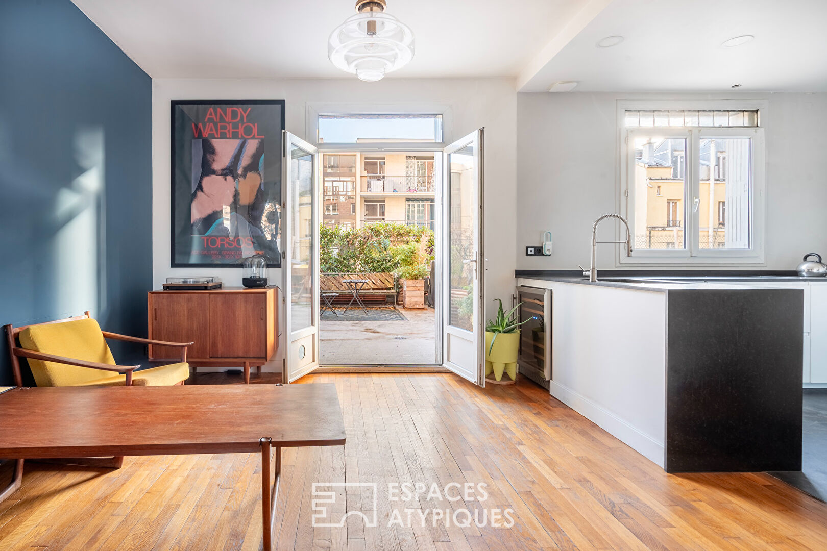 Appartement traversant au pied du canal de l'Ourcq