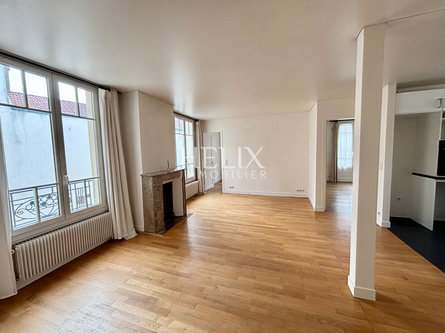 Photo Appartement avec le charme de l'ancien en plein coeur de Saint Germain En Laye 3 pièce(s) 62M2. image 5/6