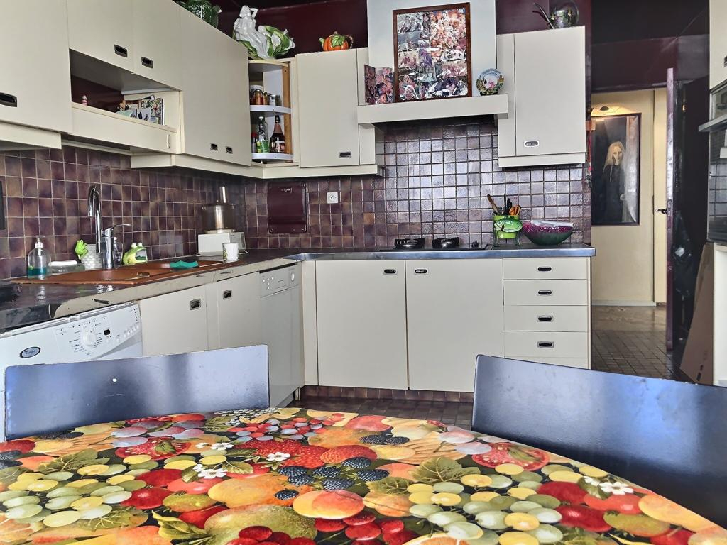 Photo Appartement Paris 4 pièce(s) 105 m2 image 2/5