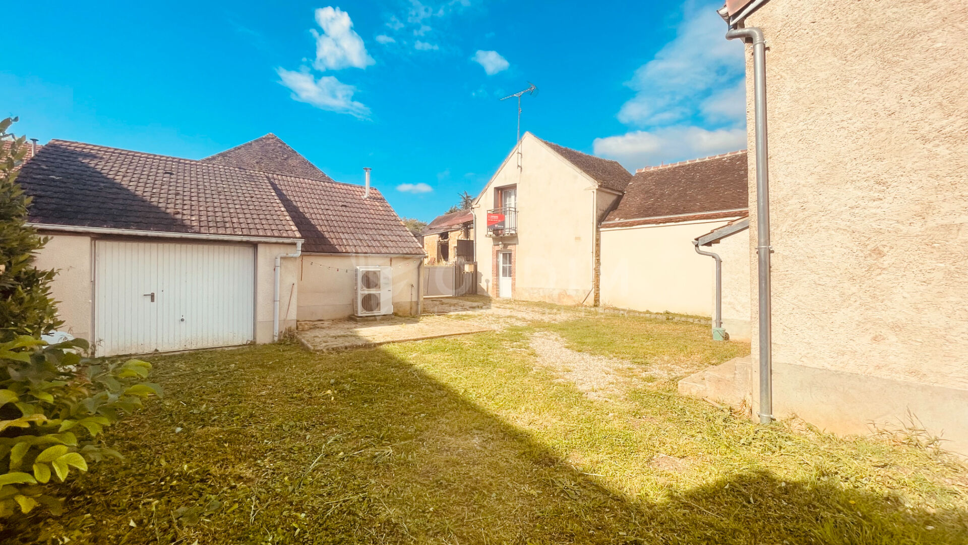 Photo Ensemble immobilier composé de 2 maisons individuelles image 3/6