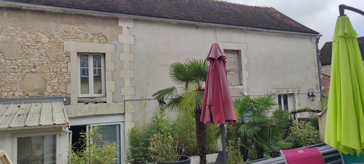 Photo Ensemble immobilier idéalement situé en centre ville. image 3/6