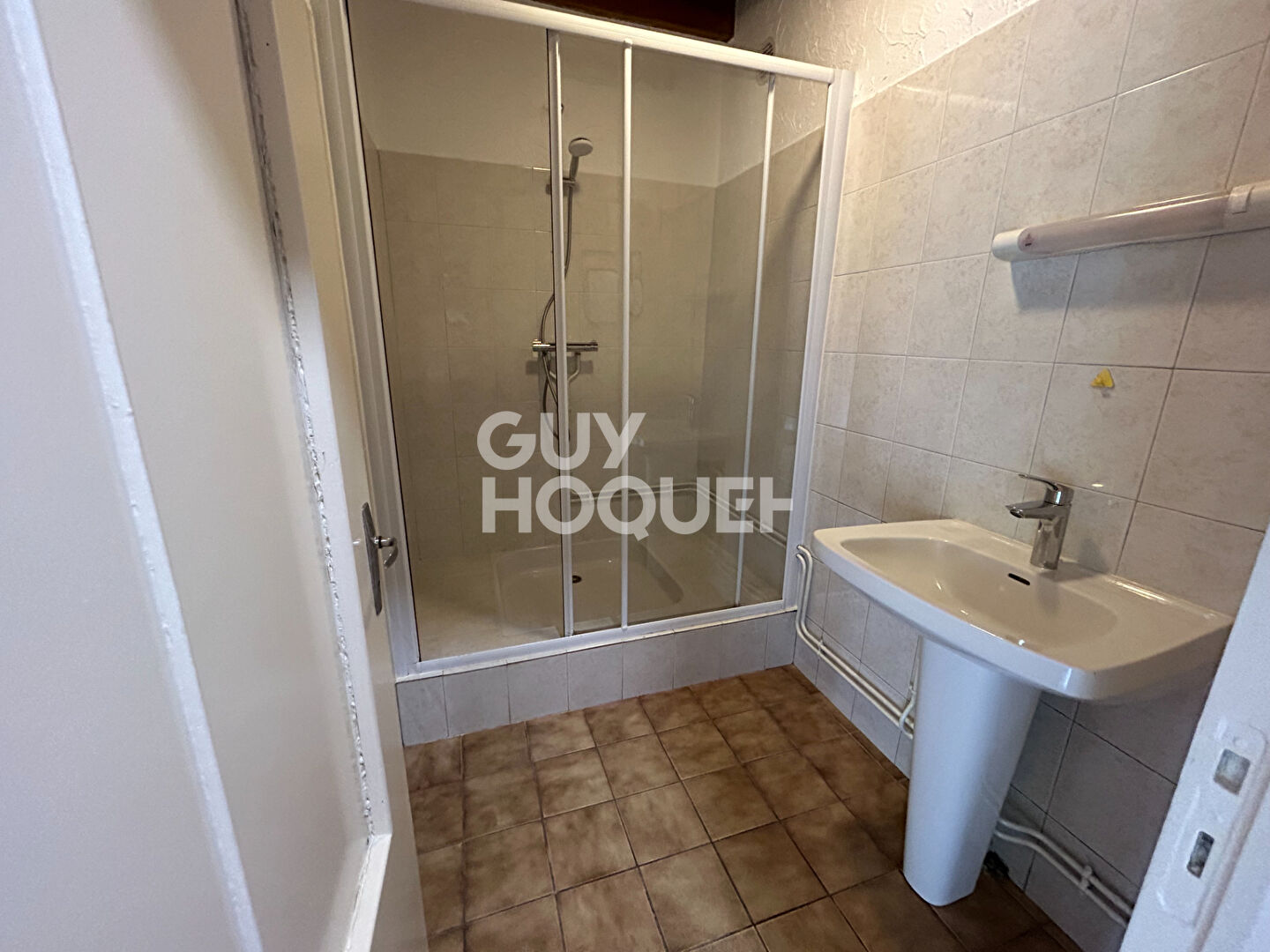 T3 proche axe avec grand jardin