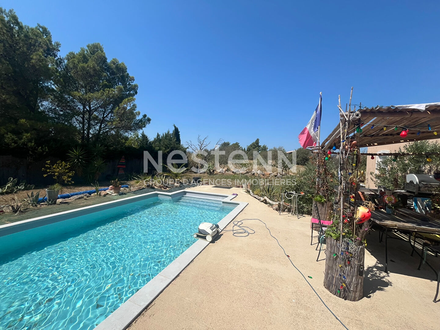 Photo Villa plain-pied 140 m² - 3 chambres, piscine et cuisine d'été sur 1200 m² à Aigues-Vives image 2/6