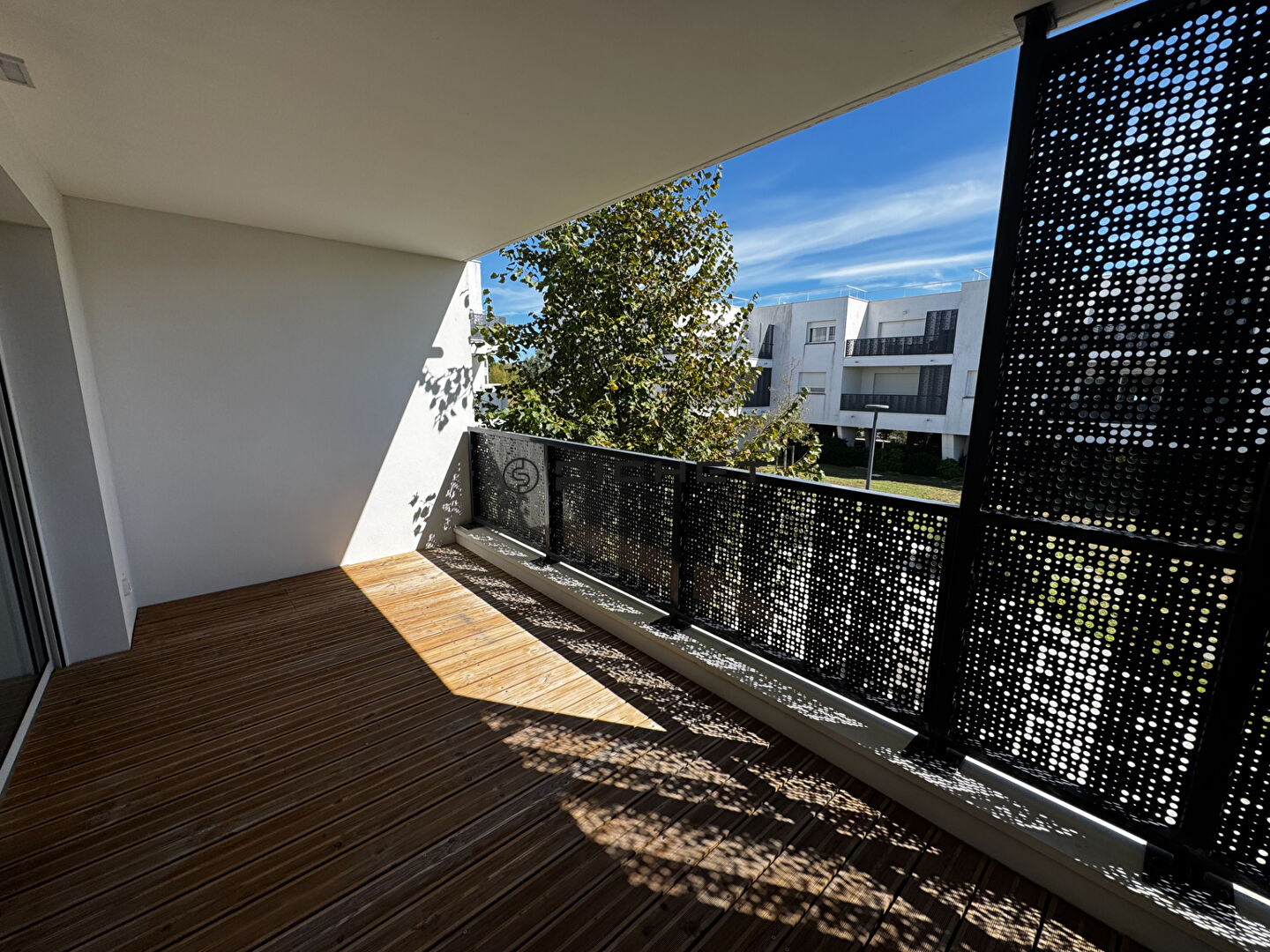 Photo Appartement de type 3 avec 2 terrasses et 2 places de parking image 2/6