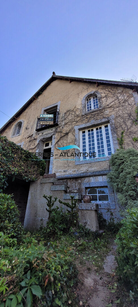 Photo Propriété remarquable de caractère avec dépendances et garage en zone constructible image 4/6