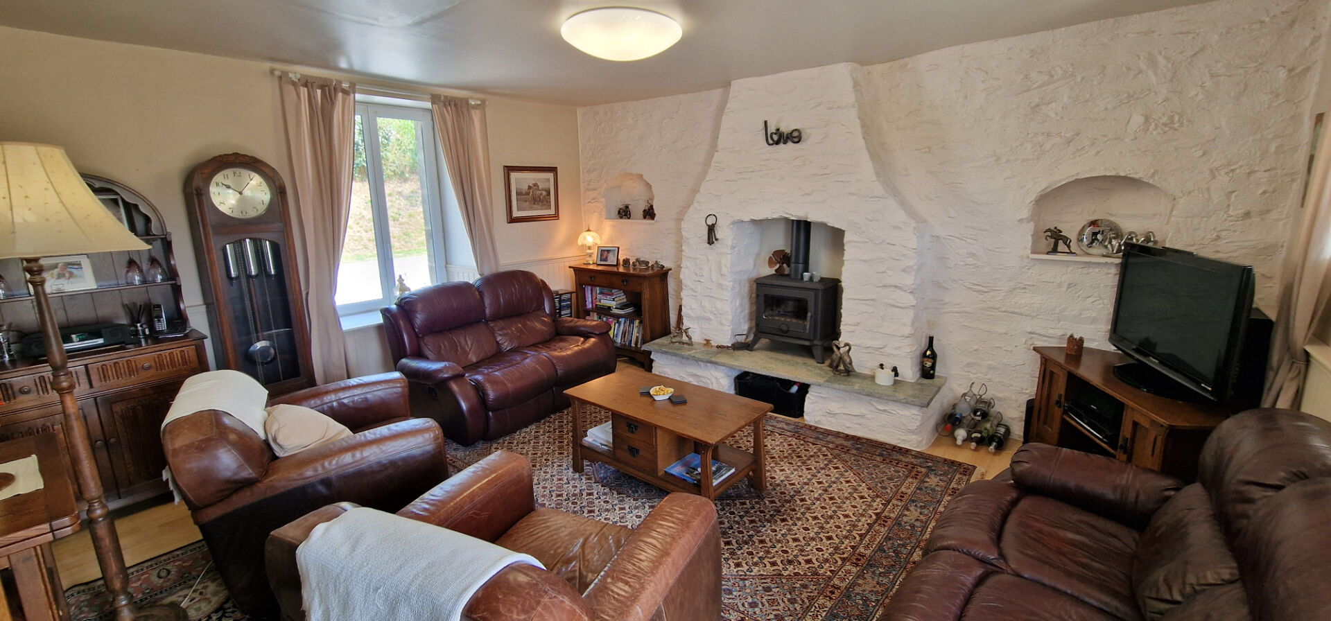 Photo COTES D'ARMOR Maison en pierre 3 chambres, bien présentée avec magnifique terrasse surélevée, vue, atelier, terrain image 5/6