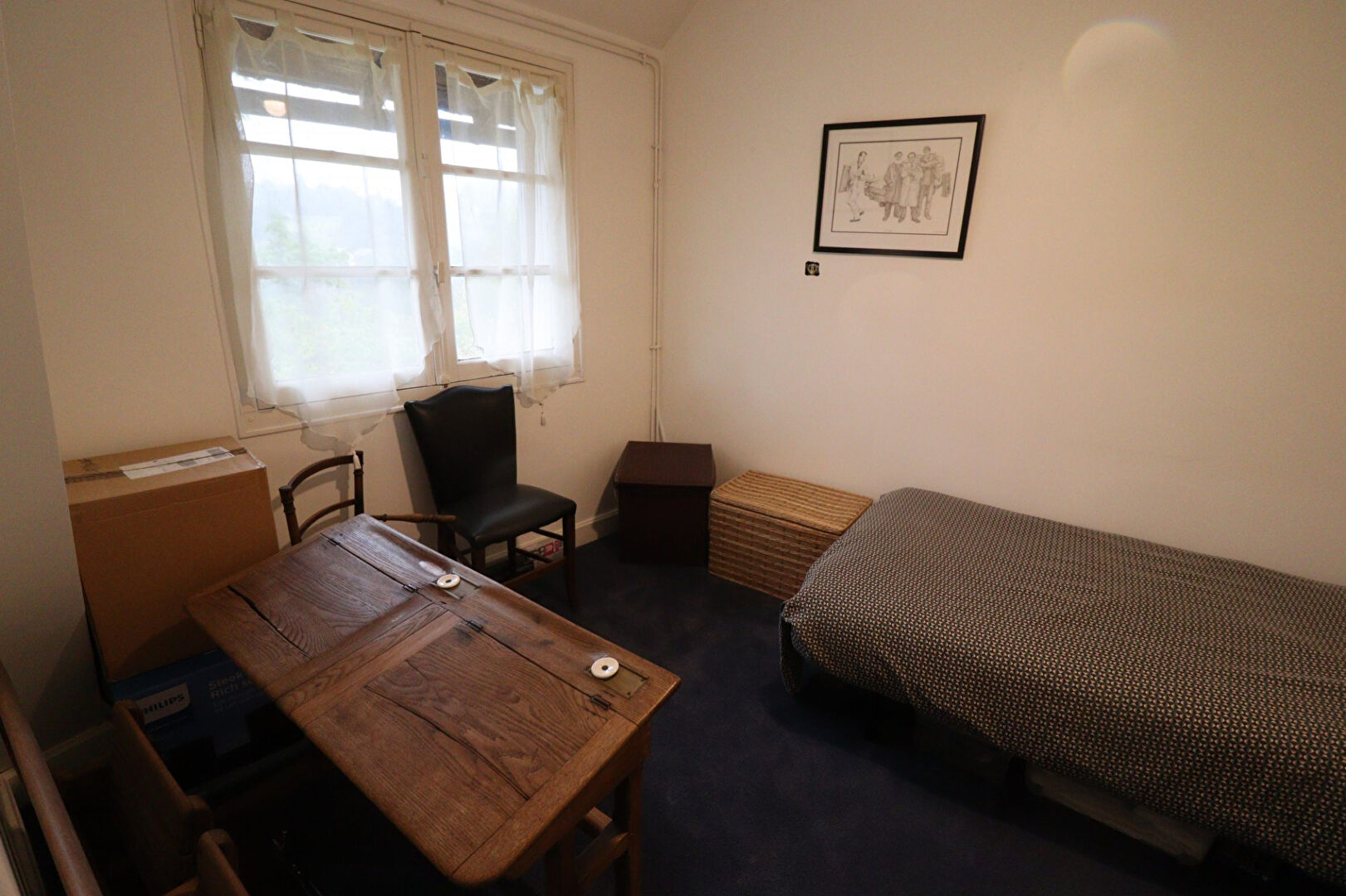 Five-bedroom property in Corrèze, Nouvelle-Aquitaine, featuring a simple interior with a bed, table, and chairs.