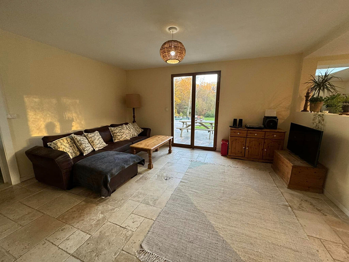 Spacious living area in a property located in Haute-Vienne, Nouvelle-Aquitaine, featuring large windows and natural light.