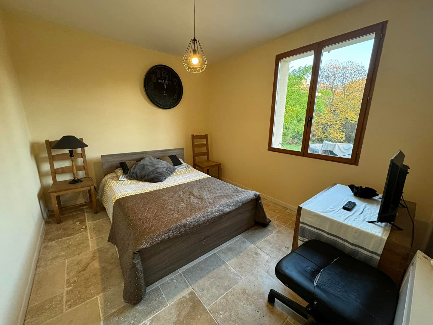 Three-bedroom property in Haute-Vienne, Nouvelle-Aquitaine, featuring a cosy bedroom with natural light and simple