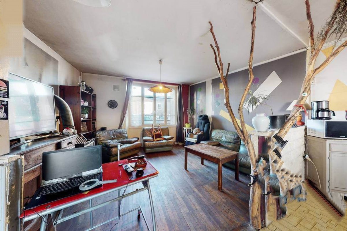 Spacious property in Creuse, Nouvelle-Aquitaine, featuring a comfortable living area with modern furnishings and natural