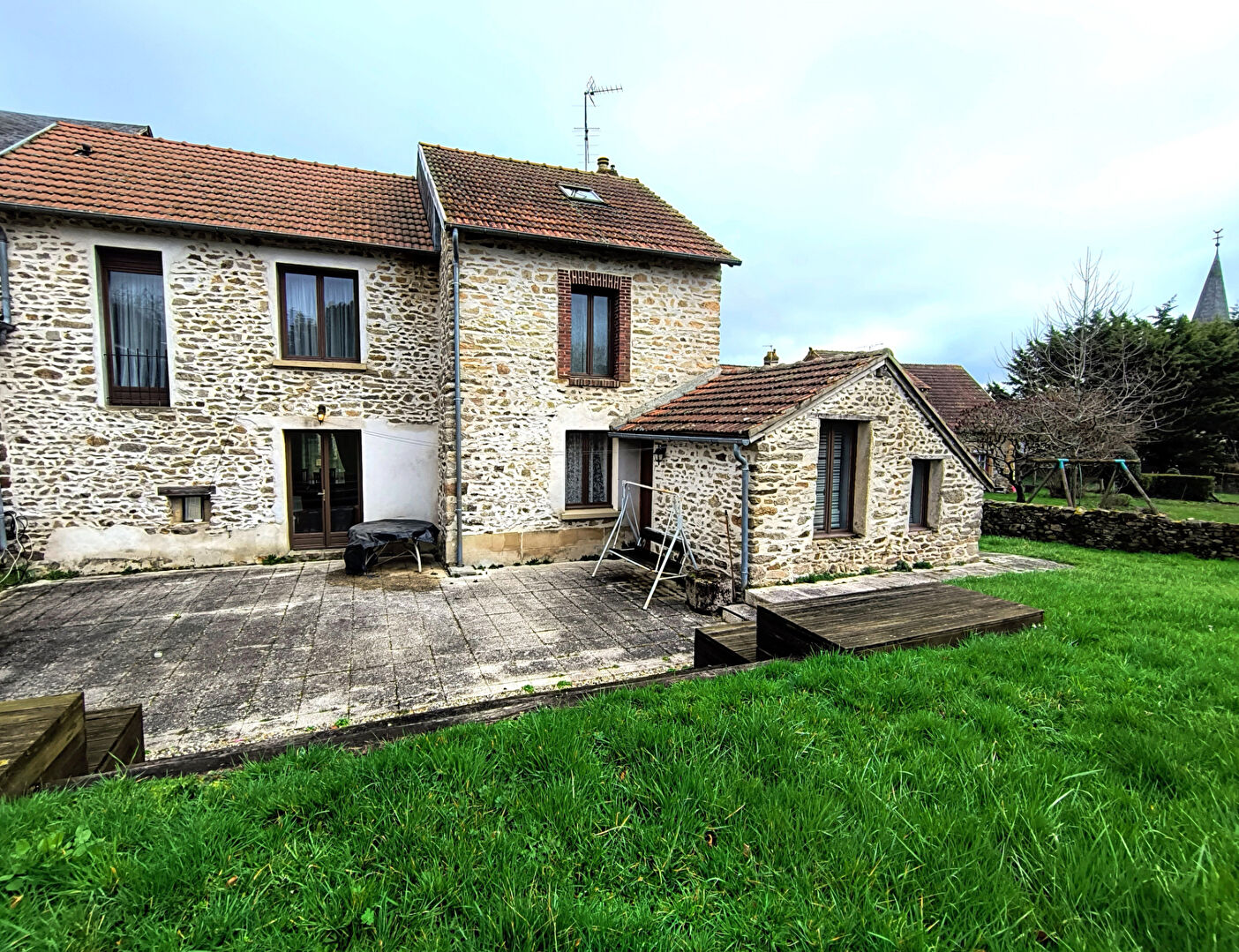 Four-bedroom property in Creuse, Nouvelle-Aquitaine, featuring a stone exterior and spacious garden area.