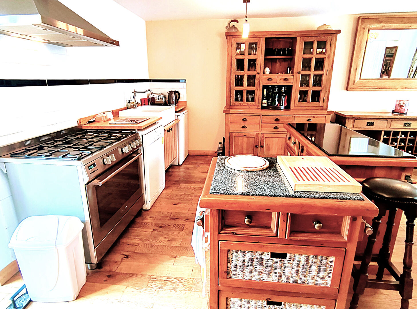 Spacious kitchen in a property located in Creuse, Nouvelle-Aquitaine, featuring wooden units and modern appliances.