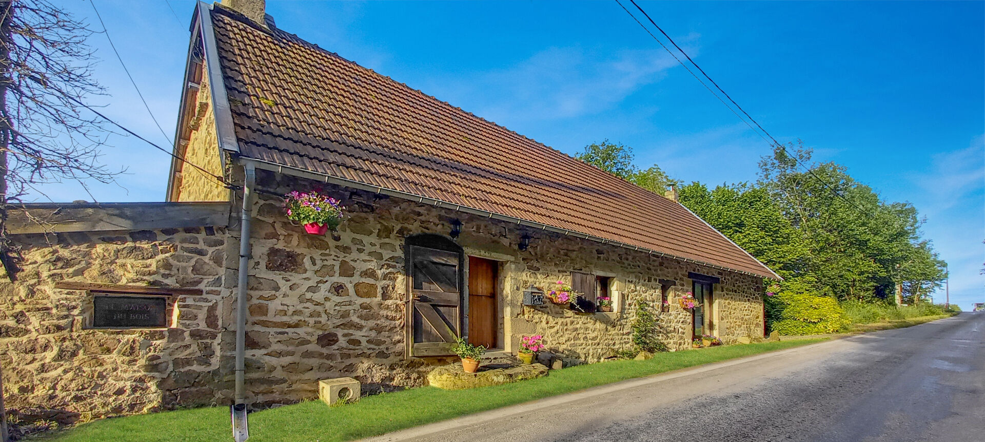 Charming property in Haute-Vienne, Nouvelle-Aquitaine, featuring stone exterior and lush surroundings.
