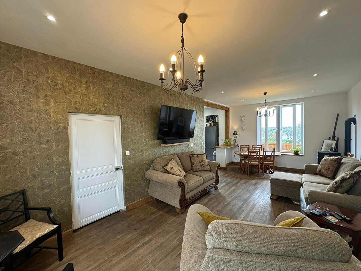 Spacious living area with modern decor in a property located in Haute-Vienne, Nouvelle-Aquitaine.