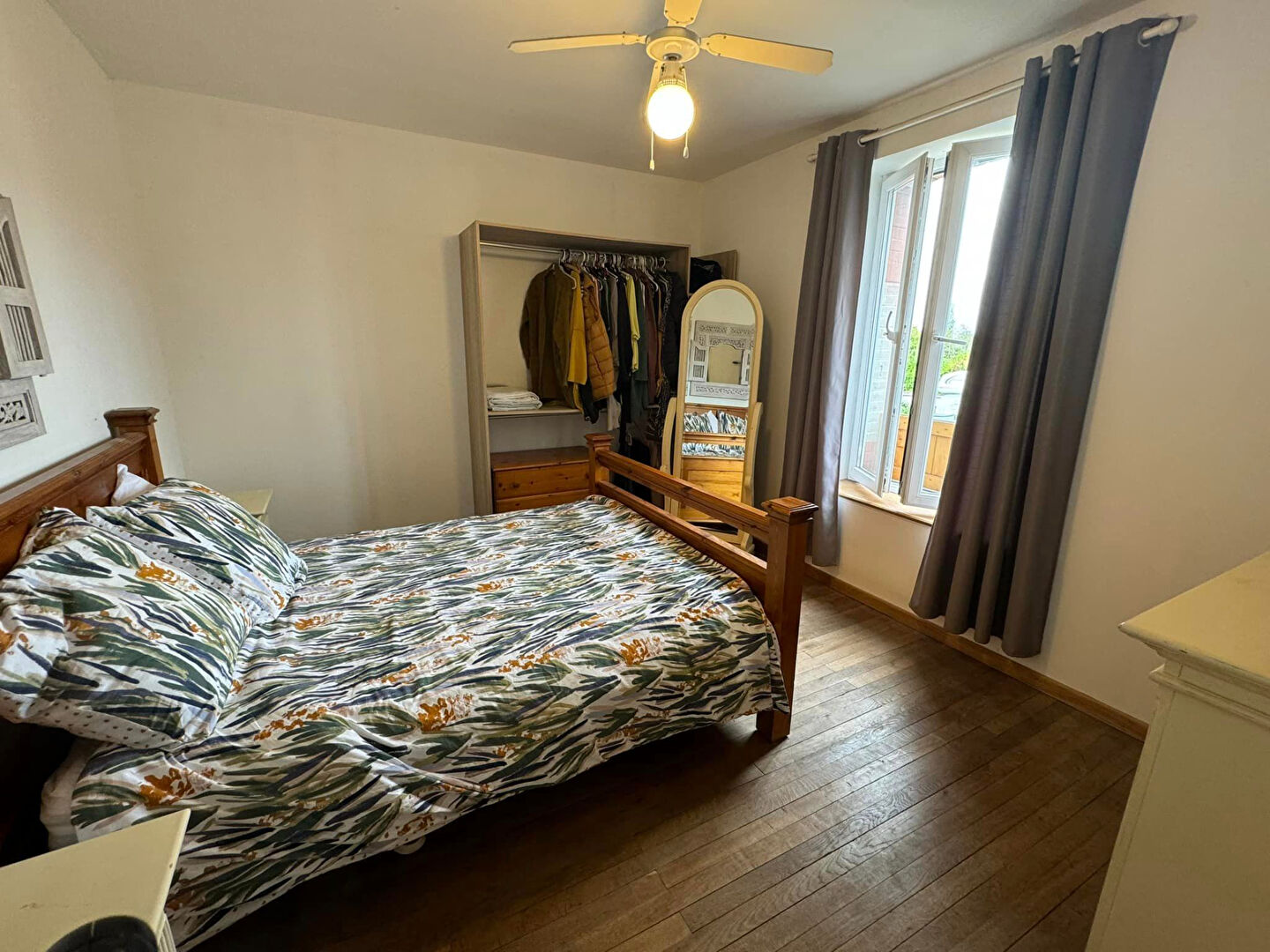 Five-bedroom property in Haute-Vienne with wooden flooring and natural light from large windows.