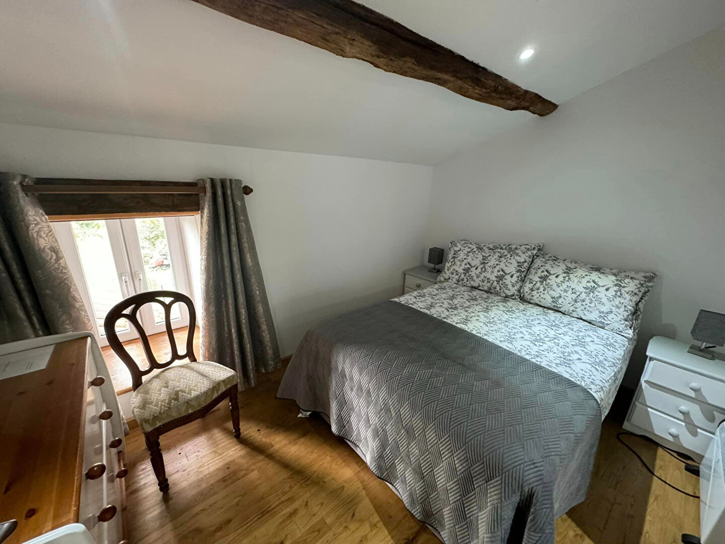 Five-bedroom property in Haute-Vienne, Nouvelle-Aquitaine, featuring wooden beams and natural light from large windows.