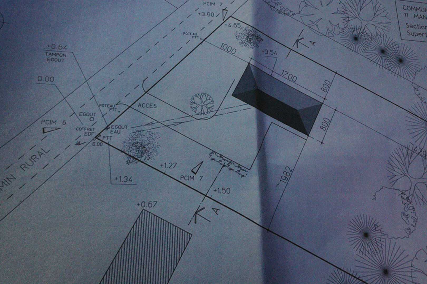 Property plan for a house in Corrèze, Nouvelle-Aquitaine, detailing layout and access points.