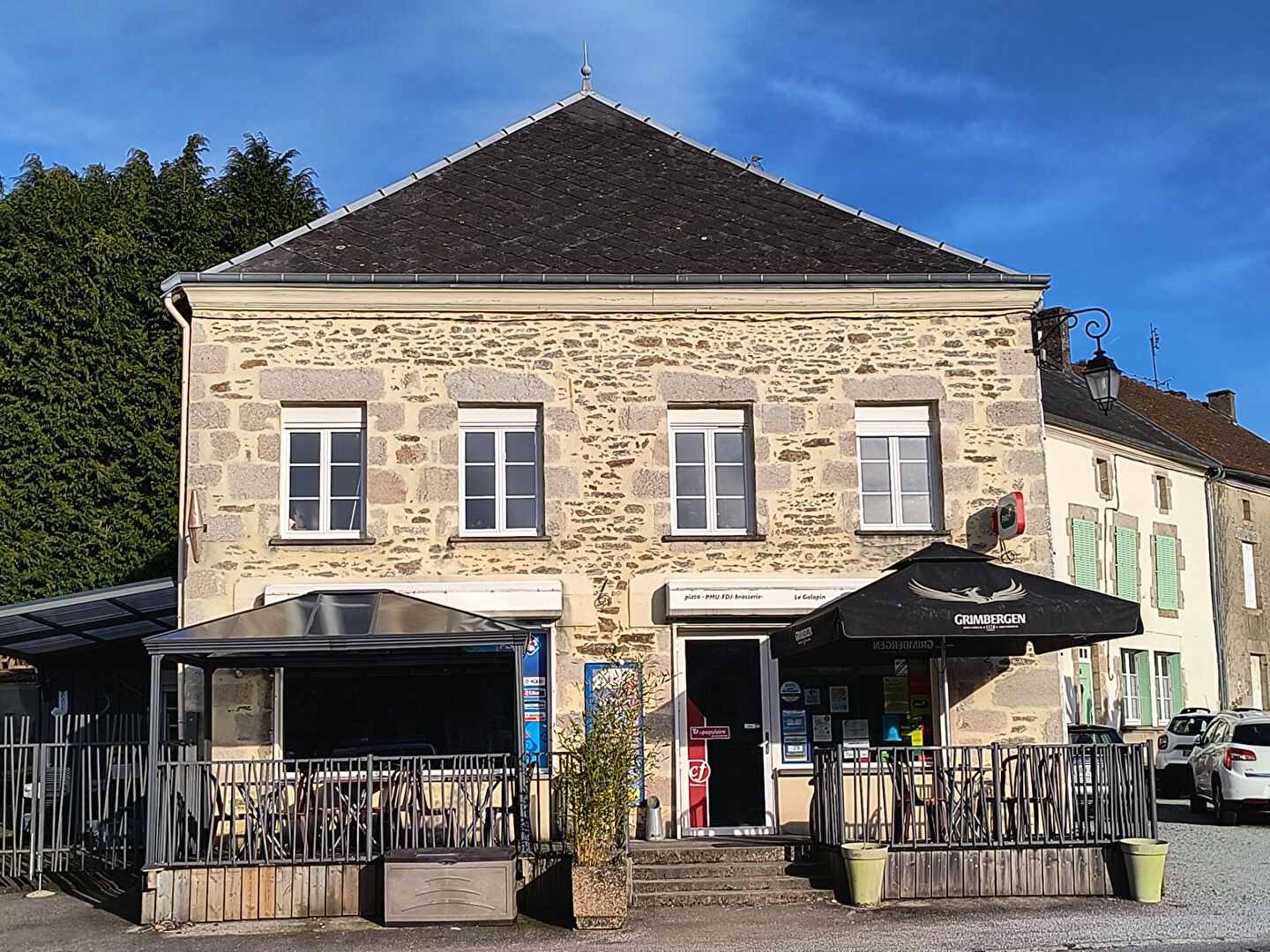 Property in Haute-Vienne, Nouvelle-Aquitaine, featuring a stone façade and outdoor seating area.
